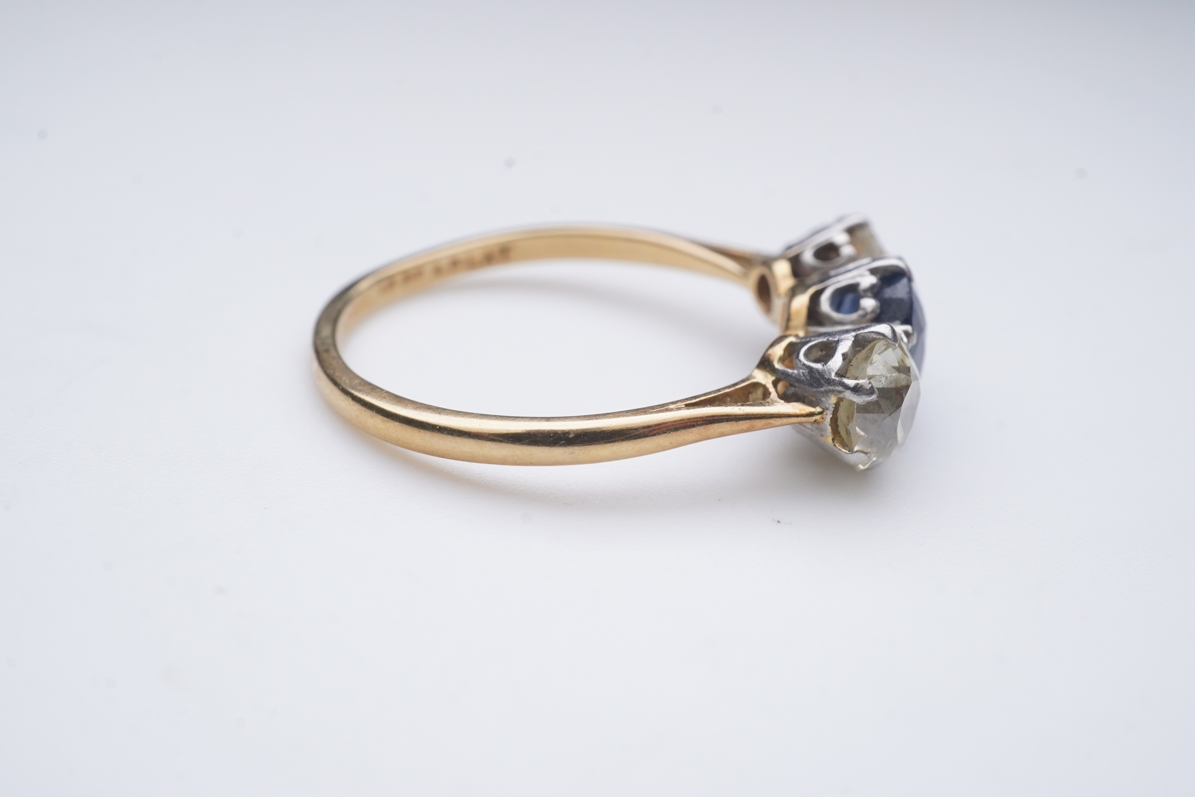 A sapphire and diamond three-stone ring, early 20th century